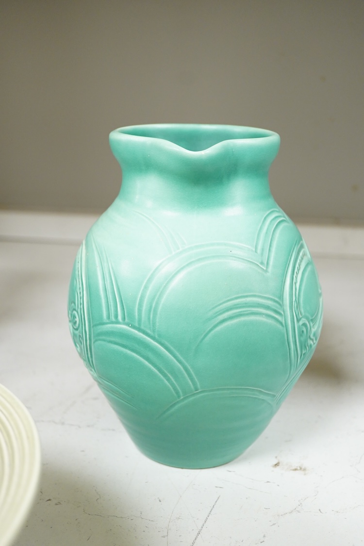 A Susie Cooper incised jug, 22cm high and similar bowl, each incised with animals (2)